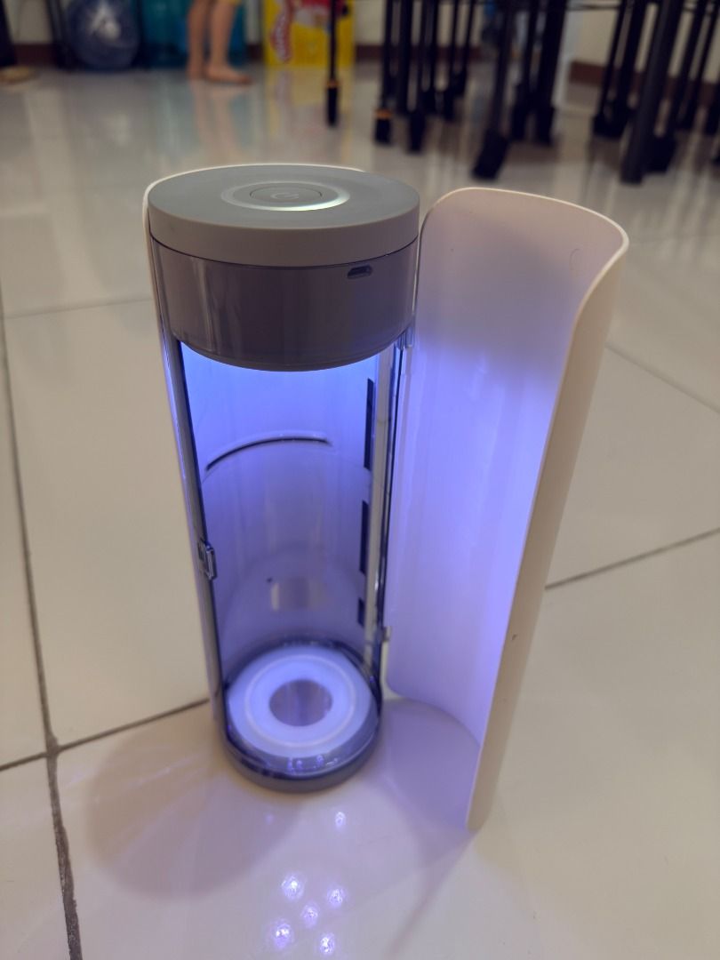 Sunuv Portable UV LED Bottle Sterilizer (Category: Breastfeeding & Bottle Feeding) located in Manila. Submitted by pearleee (Listing ID 1430643122, Image 2). Description: Sunuv portable UV LED bottle sterilizer. It is designed to sterilize bottles. The color is grey. It has a cylindrical shape with a door. The sterilizer is designed to be portable. Rarely used, no box, no usb cable RFS: babies all grown up Item is located in Taguig.