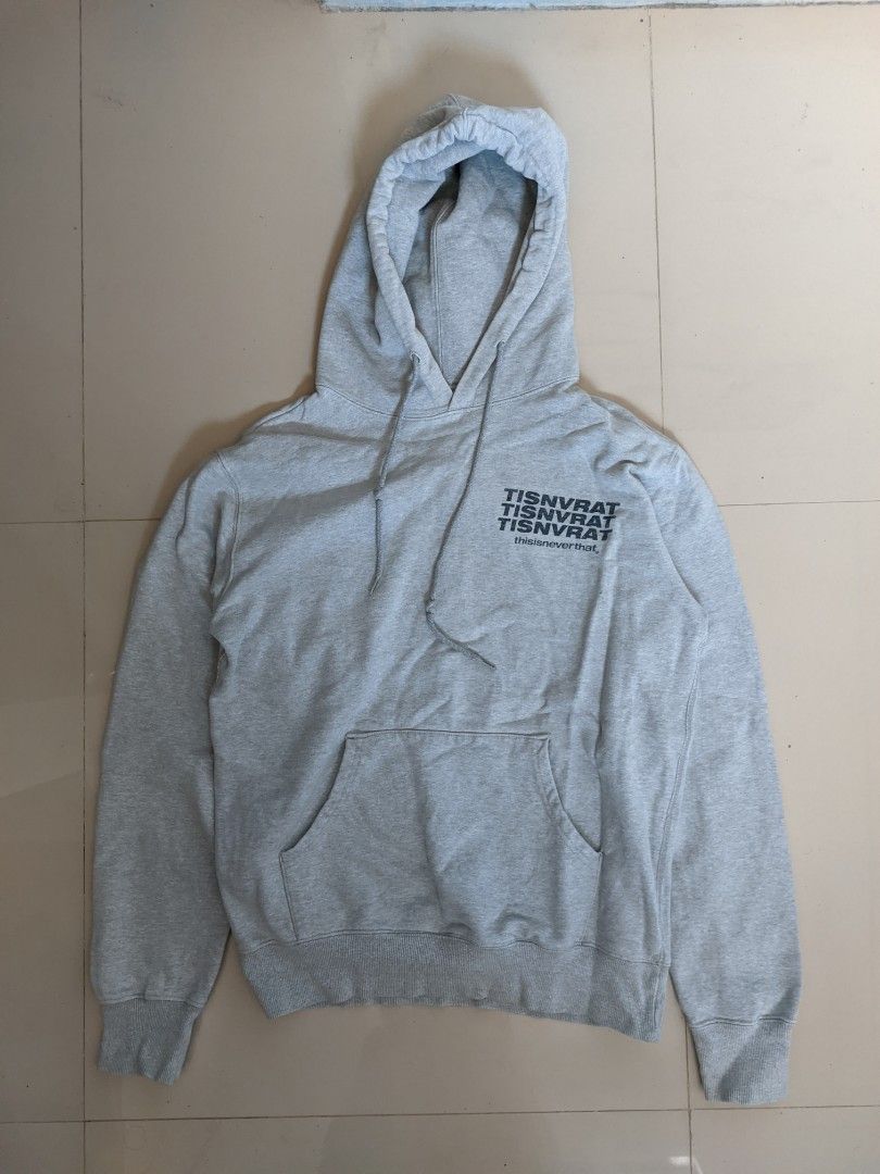 thisisneverthat Cross Ten (10) hoodie (Category: Hoodies) located in Gapan. Submitted by ukayukay9 (Listing ID 1430634492, Image 3). Description: Grey hoodie from thisisneverthat. It features a cross graphic on the back and the brand's logo on the front. The hoodie has a kangaroo pocket and a drawstring hood. The size is small. Made from 100% cotton..