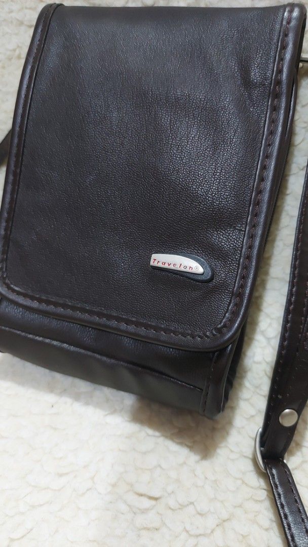 Travelon Small Sling Brown Bag (Category: Cross-body Bags) located in Gattaran. Submitted by 2nd_charm (Listing ID 1430737093, Image 2). Description: .