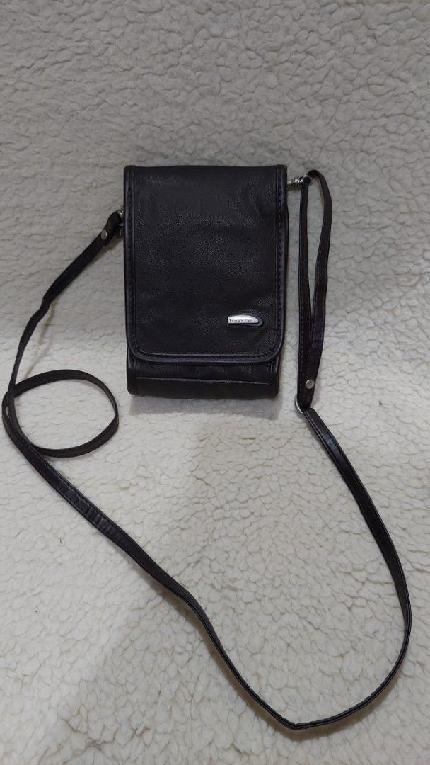 Travelon Small Sling Brown Bag (Category: Cross-body Bags) located in Gattaran. Submitted by 2nd_charm (Listing ID 1430737093, Image 1). Description: .