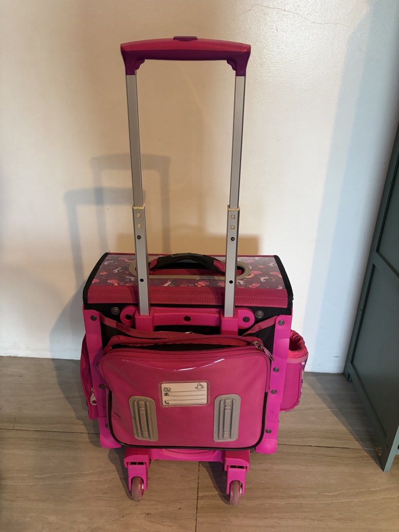 Trolley Robby Rabbit Rolling School Bag with Lunch Bag (Category: Babies & Kids Fashion) located in Pasig City. Submitted by strawberryshortcakey (Listing ID 1430694088, Image 2). Description: Robby Rabbit Trolly In Good condition W free bag cover and lunchbag Handle and wheels are all working properly .