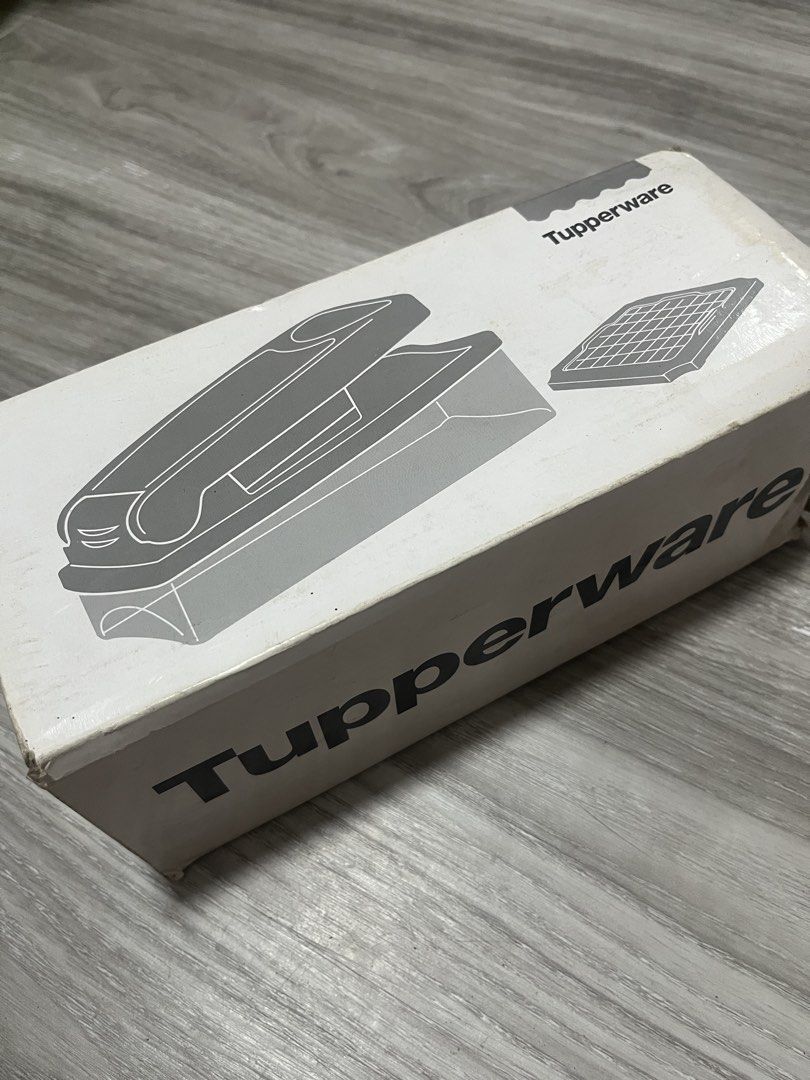 Tupperware Super Dicer (Category: Cookware & Accessories) located in Quezon City. Submitted by larenaxoxo (Listing ID 1430602315, Image 1). Description: - Tupperware Super Dicer - Multipurpose and powerful - Includes multiple blades for different cuts - Easy to use and clean - Perfect for quick food preparation.