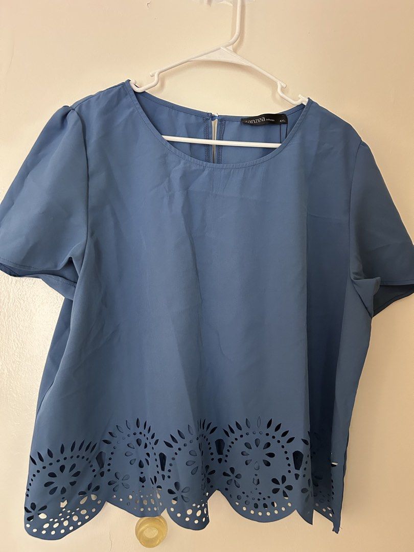 Zanzea Blue Laser Cut Top 4XL (Category: Blouses) located in Bacoor. Submitted by maytime (Listing ID 1430741034, Image 1). Description: - Zanzea blue top - Size: 4XL - Design: Laser cut hem - Sleeves: Short - Neckline: Round - Closure: Keyhole back.