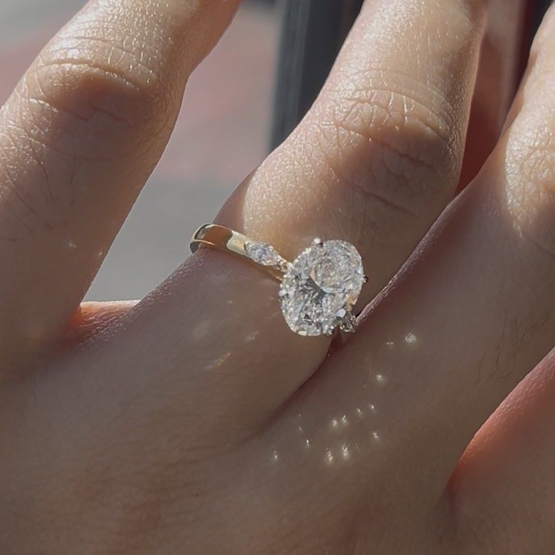 2ct Oval Engagement ring lab grown diamond 18k gold (Category: Rings) located in Del Monte. Submitted by bellamente (Listing ID 1430908421, Image 2). Description: 2ct oval engagement ring Lab grown diamond 18k yellow gold band 18k white gold prongs IGI Certificate included Size 6 onhand 99,000.00 only .