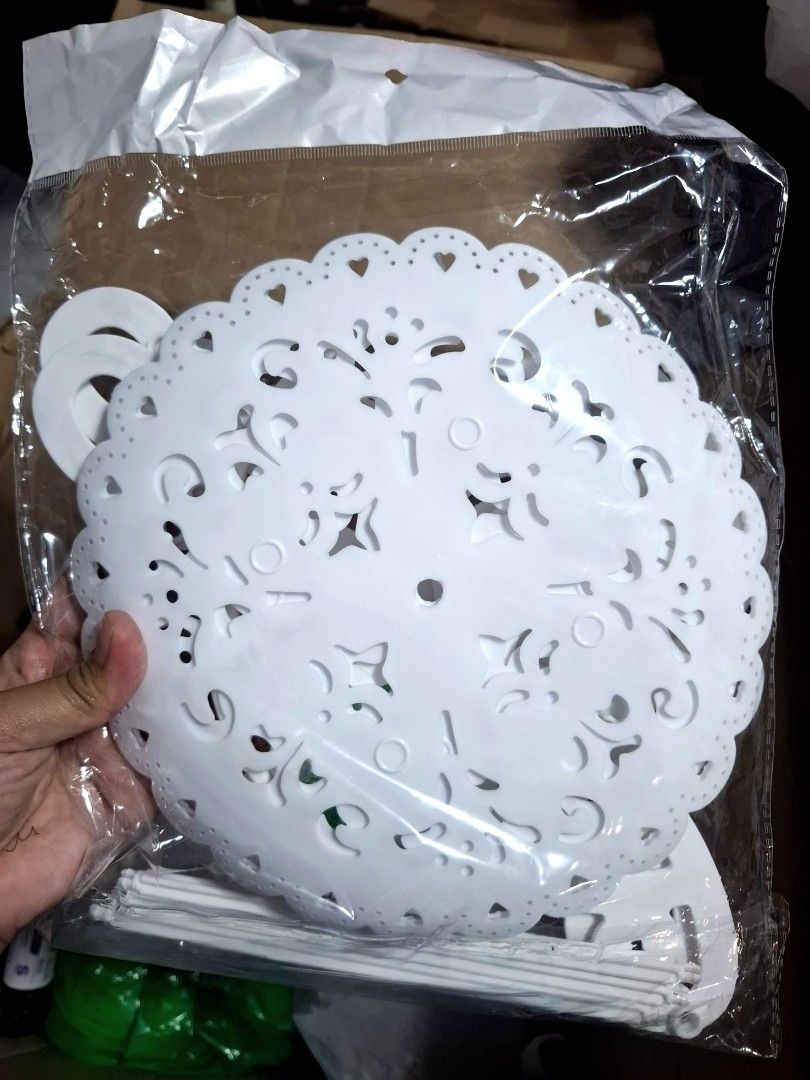 2-Tier White Cake Cupcake Stand (Category: Bakeware) located in Quezon City. Submitted by an.marie (Listing ID 1430814211, Image 2). Description: 2-tier white cake stand. It features a delicate, lacy design on the plates and supports. Perfect for displaying cupcakes, pastries, or other treats at parties or events..