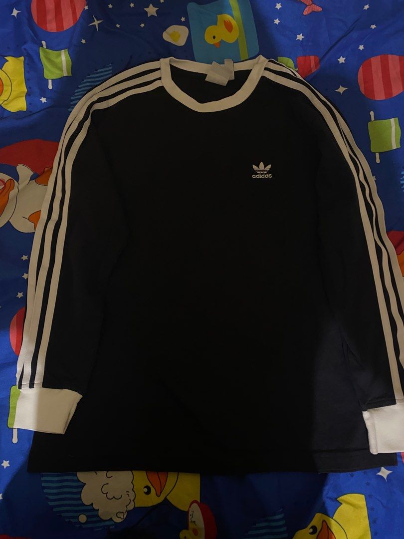 Adidas longsleeve (Category: Tshirts & Polo Shirts ) located in Las Pinas. Submitted by jas_items (Listing ID 1430942939, Image 1). Description: Length- 25 Width- 18 Excellent condition plus shipping.