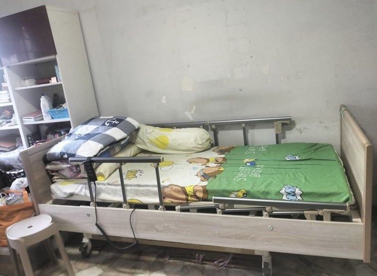 Adjustable Bed (Category: Rehabilitative Devices) located in Singapore. Submitted by championflower (Listing ID 1430873846, Image 1). Description: • Adjustable hospital bed • Used for less than 4 months.