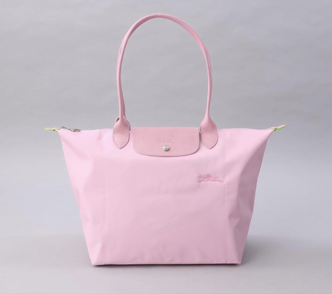 Authentic Longchamp Le pliage light pink rose tote in large (Category: Luxury Bags & Wallets) located in Manila. Submitted by pursonalshopper (Listing ID 1430920138, Image 3). Description: Complete inclusions With dustbag, tags and paperbag .