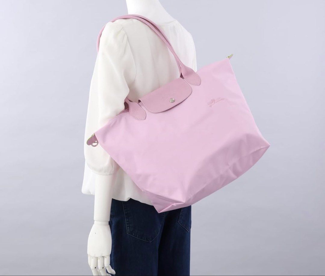 Authentic Longchamp Le pliage light pink rose tote in large (Category: Luxury Bags & Wallets) located in Manila. Submitted by pursonalshopper (Listing ID 1430920138, Image 2). Description: Complete inclusions With dustbag, tags and paperbag .
