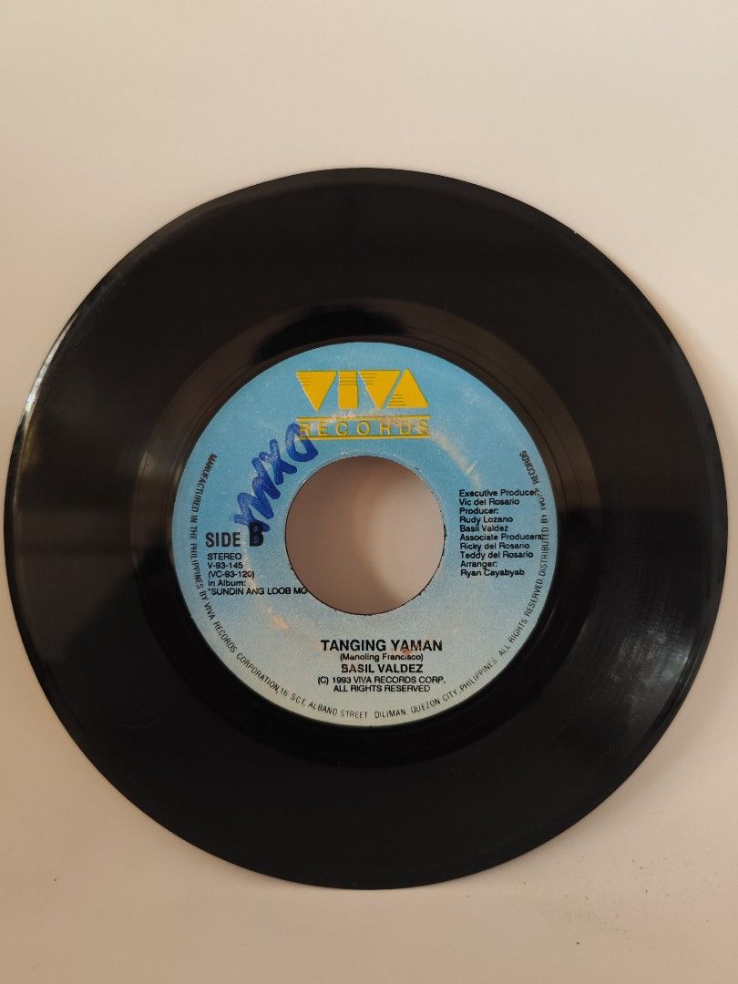Basil Valdez Vinyl Record (Category: Vinyls) located in Davao. Submitted by pasio (Listing ID 1430875055, Image 2). Description: Vinyl record features Basil Valdez. Side A includes the song "Ama" and Side B includes the song "Tanging Yaman". The record is a 7-inch single. It is produced by Viva Records. The record is black..
