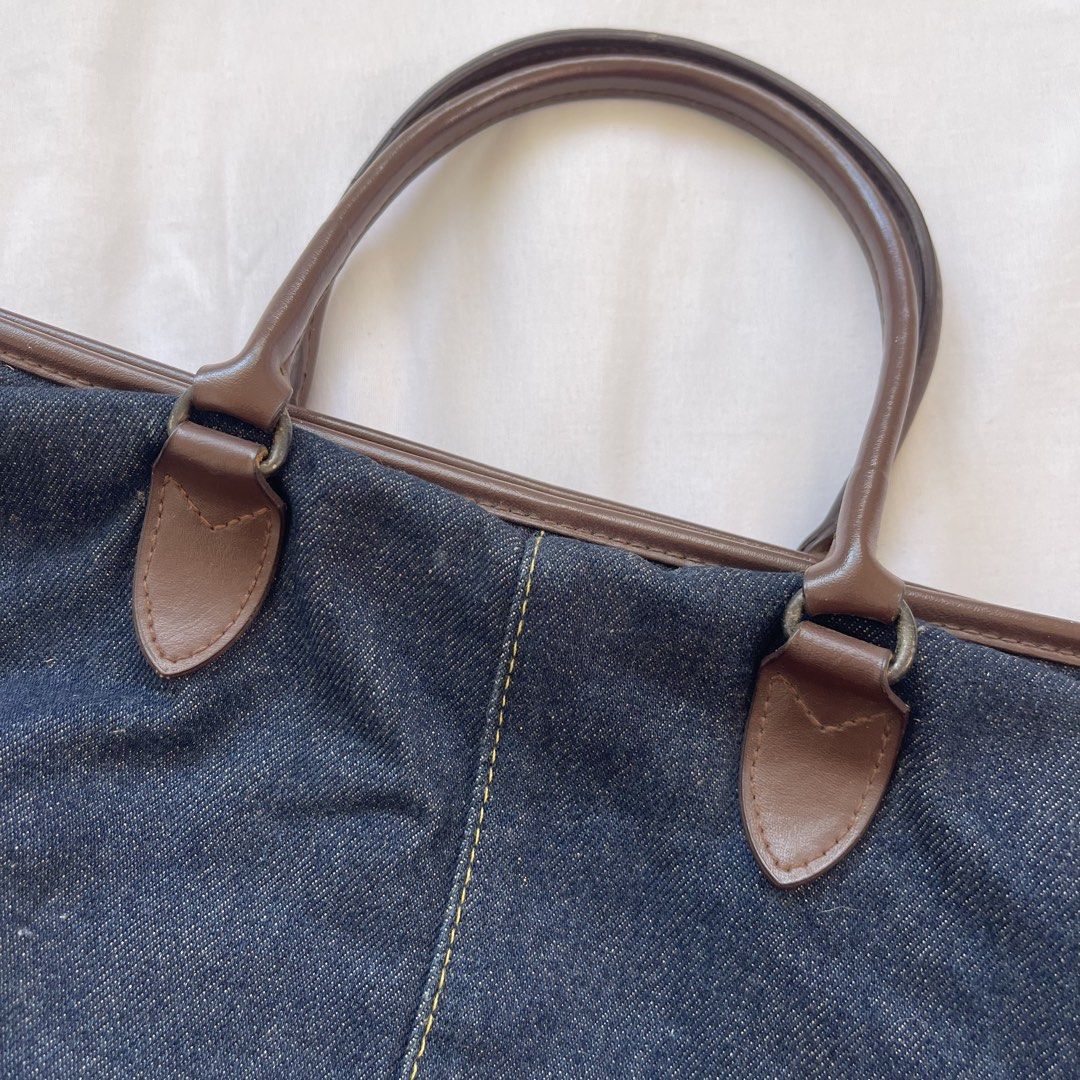 BOSSINI Ladies Denim Mini Handbag (Category: Purses & Pouches) located in Cavite. Submitted by ruesellsph (Listing ID 1430849025, Image 3). Description: Dimensions: 12in(L)x5in(H)x3in(W) -good condition -check pics for flaws Payment: Gcash, BDO or RCBC Delivery: sdd via Lalamove NOTE: All items are preloved and sold as-is. Please manage expectations..