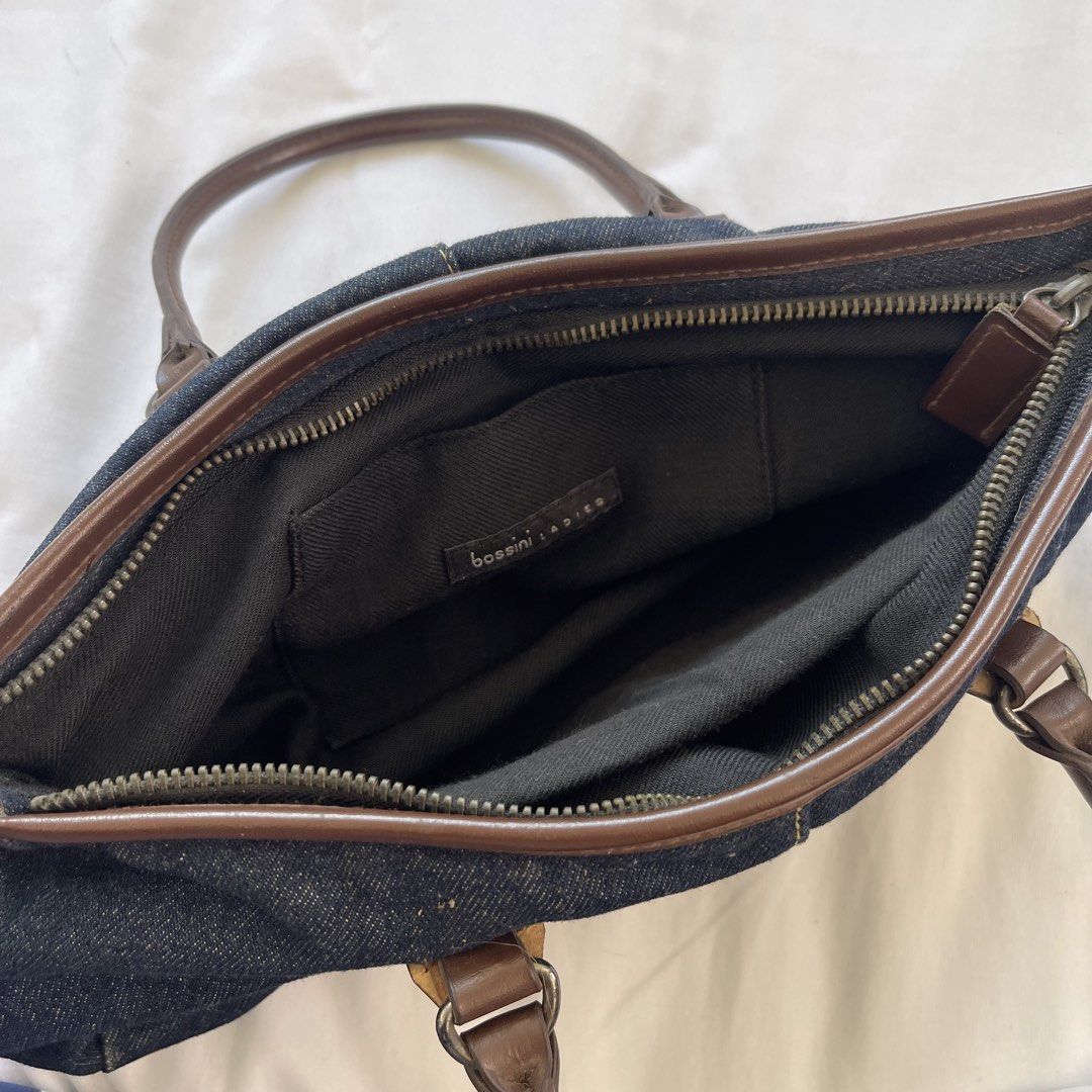 BOSSINI Ladies Denim Mini Handbag (Category: Purses & Pouches) located in Cavite. Submitted by ruesellsph (Listing ID 1430849025, Image 2). Description: Dimensions: 12in(L)x5in(H)x3in(W) -good condition -check pics for flaws Payment: Gcash, BDO or RCBC Delivery: sdd via Lalamove NOTE: All items are preloved and sold as-is. Please manage expectations..