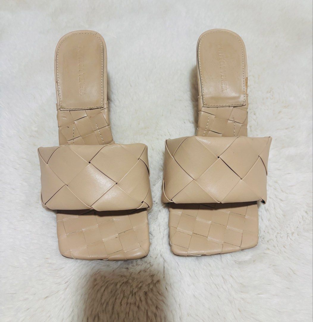 Bottega Veneta Lido Sandals-Authentic (Category: Sneakers & Footwear) located in Batangas. Submitted by aveena0413 (Listing ID 1430938578, Image 1). Description: Bottega Veneta Lido Sandals (Size 40) • Elegant neutral beige color • Signature woven strap design • Modern square toe with stiletto heels • Classic and versatile style, perfect for any outfit • With Bottega Veneta logo on the sole (still with protective plastic) • Gently used, well take