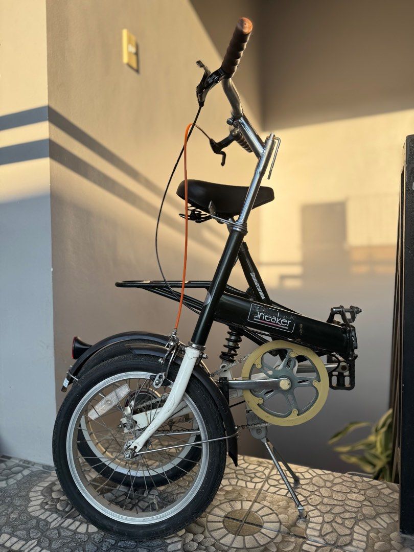 bridgestone sneaker 16” folding bike (Category: Bicycles) located in Antipolo. Submitted by bananadeclutter (Listing ID 1430977947, Image 1). Description: • dark green • single speed • shimano parts • high tensile steel frame • folding pedal • w built-in heavy duty carrier • w rear suspension • center stand • alloy rim .
