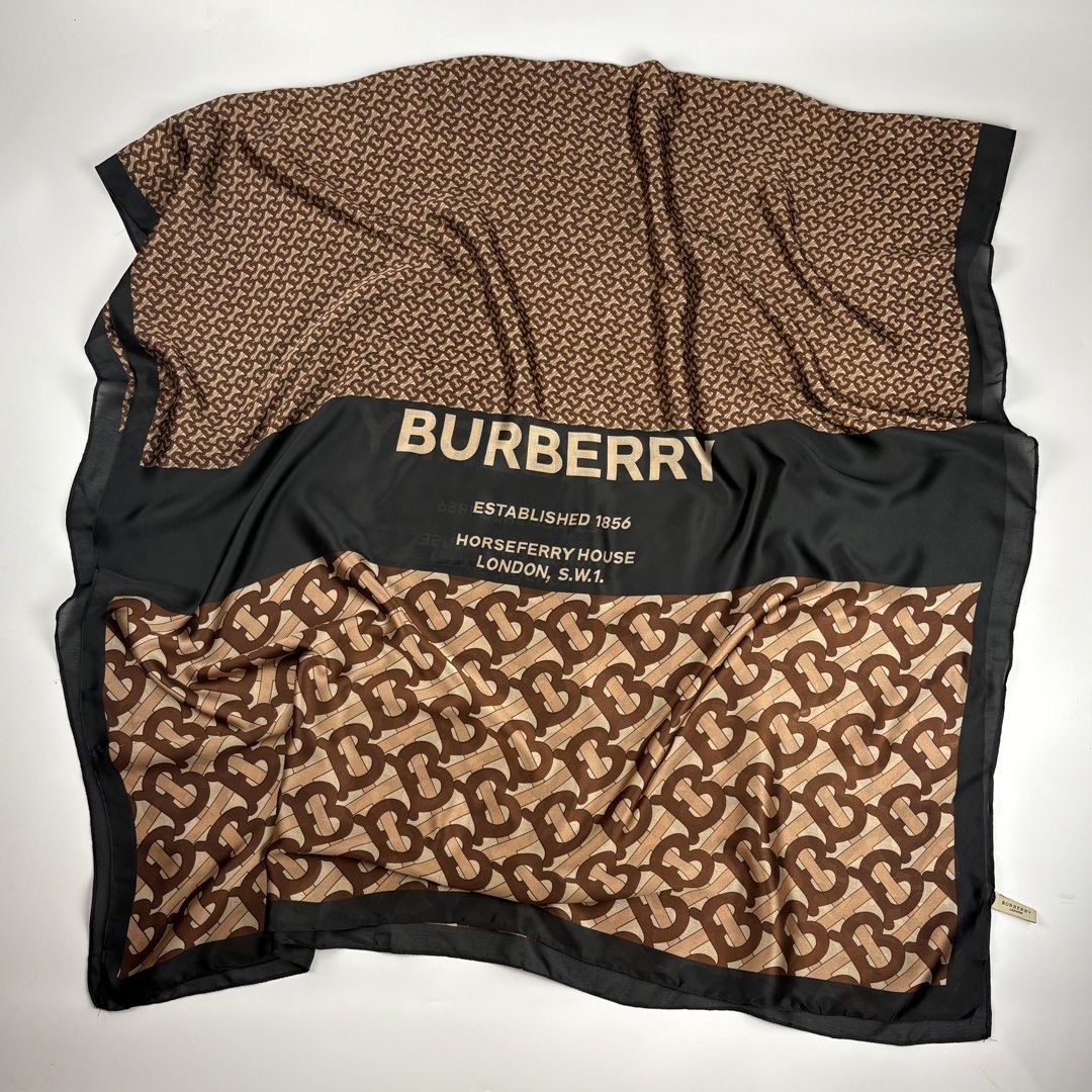 Burberry Monogram Silk Scarf (Category: Luxury Accessories) located in Bacolod City. Submitted by cast.archives (Listing ID 1430952701, Image 1). Description: Burberry Monogram Silk Scarf Size: Large Condition: Excellent Flaw: None Measurements: Width: 35" Length: 72".