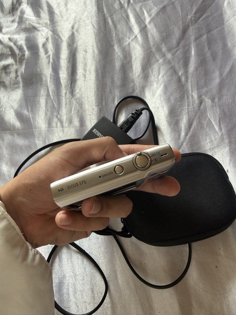 Canon IXUS 175 Digital Camera (Category: Cameras) located in Manila. Submitted by its.mickey (Listing ID 1430870063, Image 3). Description: - Canon IXUS 175 digital camera (silver) - Includes charger and black pouch - Built-in flash - Features function buttons - Camera is shown powered on NO ISSUE, LIKE NEW. NO SCRATCH.