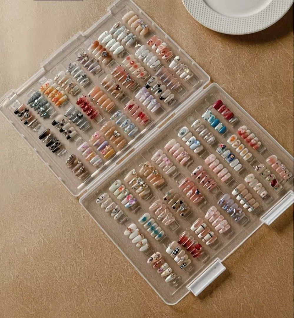 Clear Plastic Nail Organizer Box (Category: Storage Boxes & Baskets) located in Quezon City. Submitted by an.marie (Listing ID 1430816234, Image 2). Description: Clear plastic organizer box is perfect for storing and displaying your nail art collection. It features multiple compartments to keep your nails neatly arranged. The box has a secure latch closure to keep your items safe. It is ideal for both personal use and professional nail technician