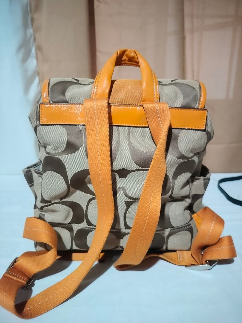 Coach Backpack (Category: Luxury Bags & Wallets) located in Marilao. Submitted by paadd (Listing ID 1430969037, Image 3). Description: Coach Backpack Black quilted leather satchel Good condition Price: 1500 Mustard yellow patent leather trim and top handle Buyer shoulders the shipping fee Meet-up available for sure buyers only SM Marilao foodcourt.