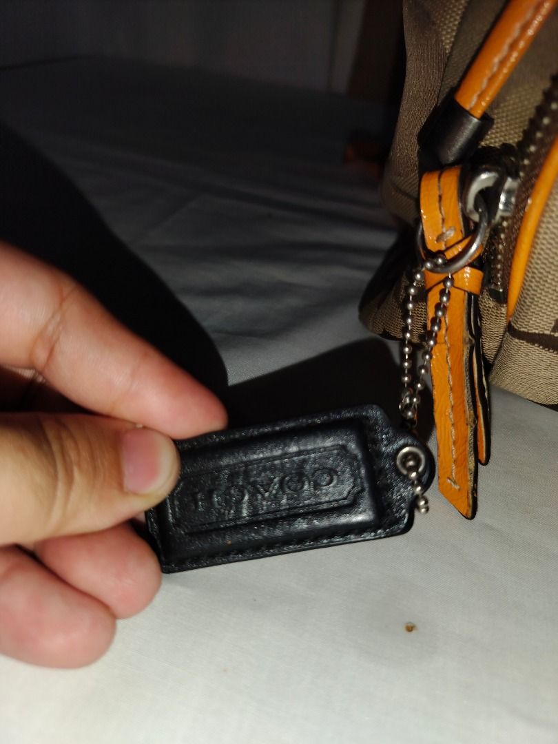 Coach Backpack (Category: Luxury Bags & Wallets) located in Marilao. Submitted by paadd (Listing ID 1430969037, Image 2). Description: Coach Backpack Black quilted leather satchel Good condition Price: 1500 Mustard yellow patent leather trim and top handle Buyer shoulders the shipping fee Meet-up available for sure buyers only SM Marilao foodcourt.