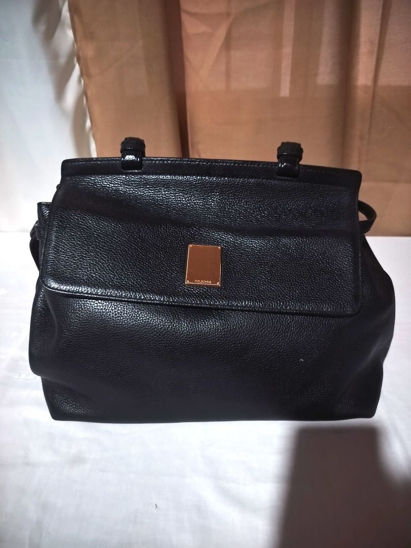 Couronne Black Leather Handbag (Category: Luxury Bags & Wallets) located in Marilao. Submitted by paadd (Listing ID 1430967820, Image 3). Description: Couronne satchel Black pebbled leather Good condition Price: 1100 Comes with detachable adjustable crossbody strap Buyer shoulders the shipping fee Meet-up available for sure buyers only SM Marilao foodcourt.