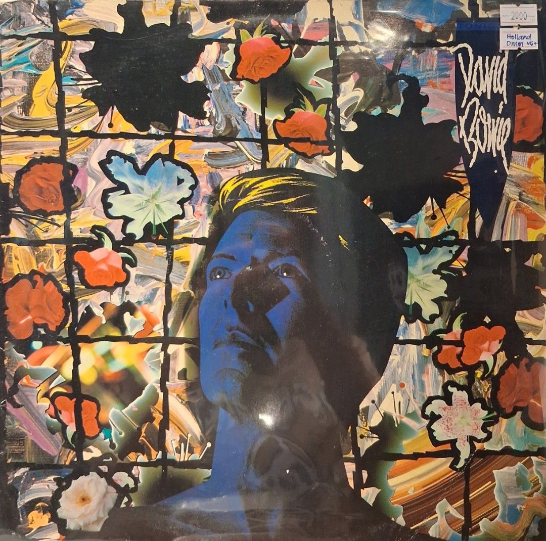 David Bowie - Diamond Dogs Vinyl Record (Category: Vinyls) located in Quezon City. Submitted by pooh_laa (Listing ID 1430801810, Image 1). Description: Original vinyl record of David Bowie's Diamond Dogs album. Features the iconic album art with a blue-toned portrait. The record is in its original sleeve. The album cover shows the artist's name and album title..