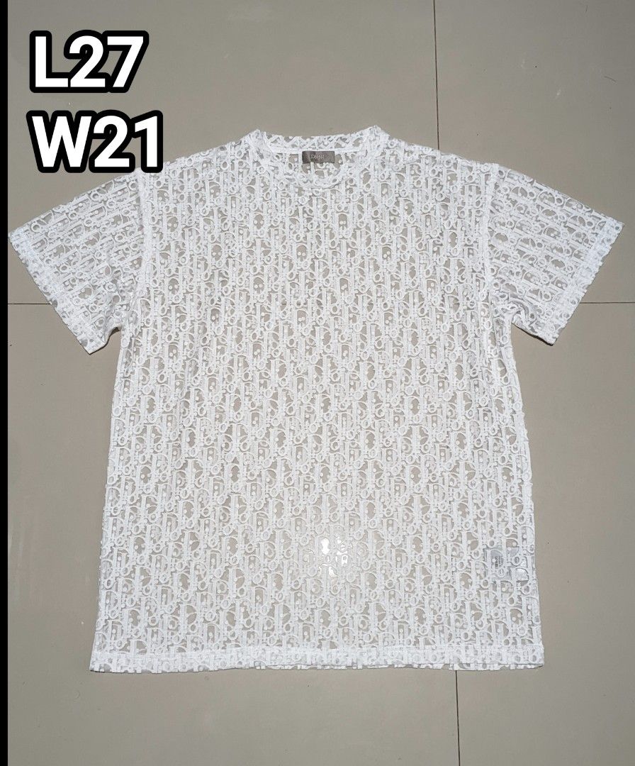 Dior White Lace T-shirt (Category: Shirts) located in Caloocan City. Submitted by wupeeram (Listing ID 1430847631, Image 1). Description: andyan n lahat details 1,500+sf issue nya nasa dulo Ng photo dko alam kung issue Yan pero tahi di nman butas pero gnyan sya dm for more info .. not sure if authentic but nice condition.