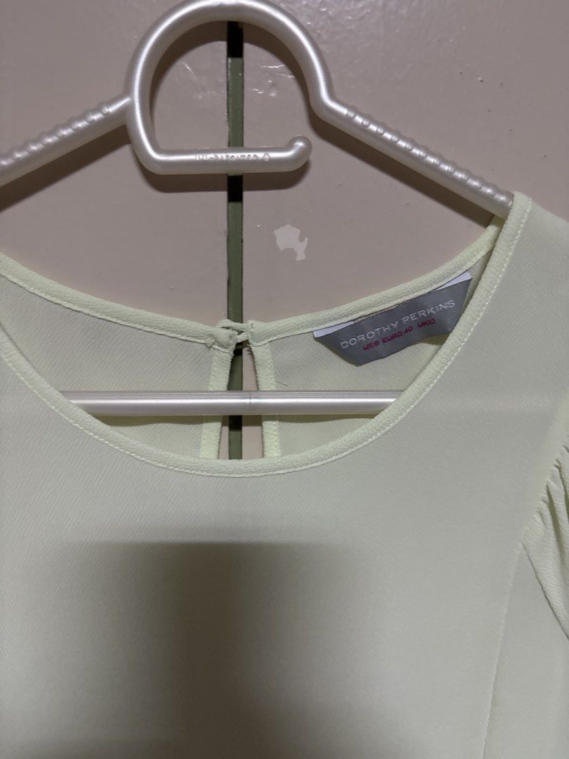 Dorothy Perkins Pastel Blouse (Category: Blouses) located in Manila. Submitted by shoplush (Listing ID 1430920462, Image 2). Description: Mint green top Fabric is 97% Polyester Medium size.