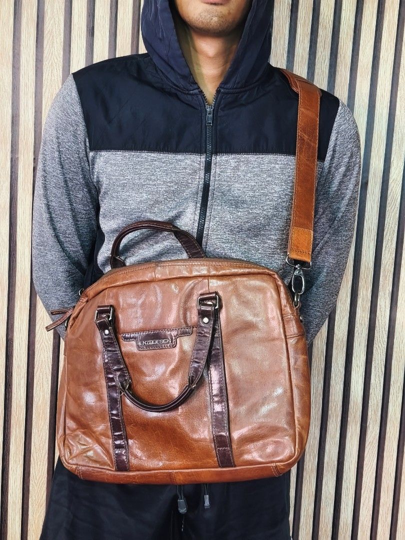 ENZO Design Buffalo Leather Sling Bag (Category: Sling Bags) located in Baguio. Submitted by baguiopinethrift (Listing ID 1430979642, Image 3). Description: ENZO Design Buffalo Leather Business Bag 2 Way siya. Removable Sling Very Good Condition Dimes: 17x14 inches Kasya 16' Laptop Price: 2k Location: Baguio Open For Shipping Open VC for item inspection 2nd pic for reference only PM Other details.🙂.