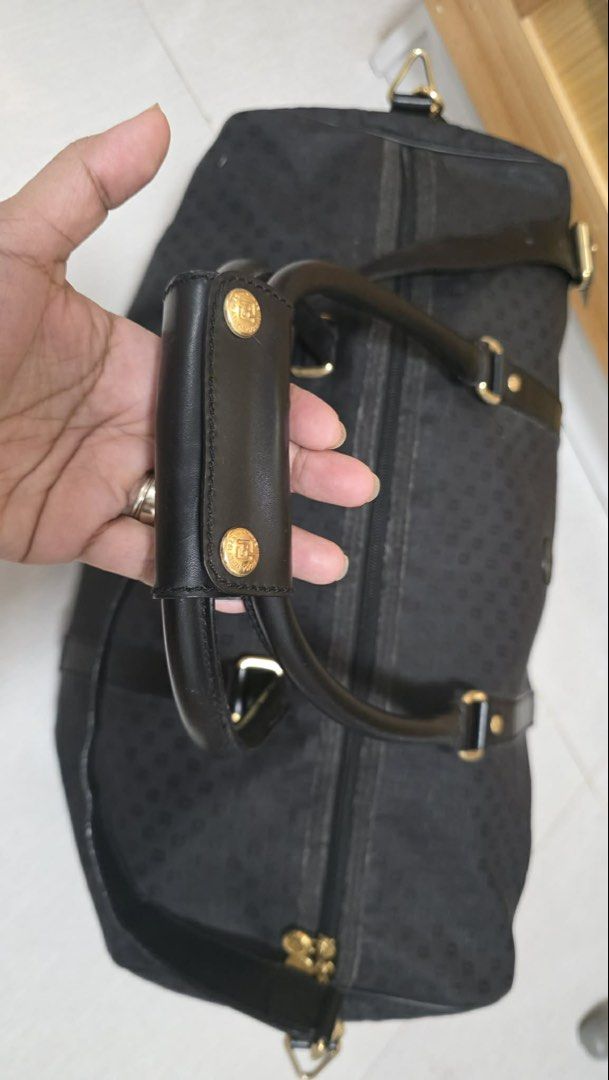 Fendi Black Duffle Bag (Category: Luxury Bags & Wallets) located in Manila. Submitted by dandrelucas01 (Listing ID 1430972654, Image 2). Description: 💯 Authentic Fendi Travel Duffle Bag - with leather strap - Gold Hardware - VG used condition - with provided dustbag ₱18,500 nego for sure buyers .