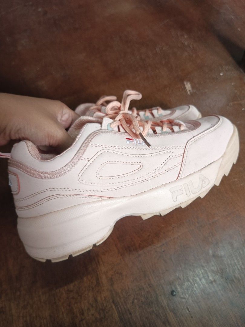Fila Disruptor II Pink Sneakers (Category: Sneakers) located in Malabon City. Submitted by mslalan (Listing ID 1430805518, Image 1). Description: Pink Fila Disruptor II sneakers. Features the Fila logo on the side and heel. The shoes have pink laces and a chunky sole. The size tag is visible in one of the images..