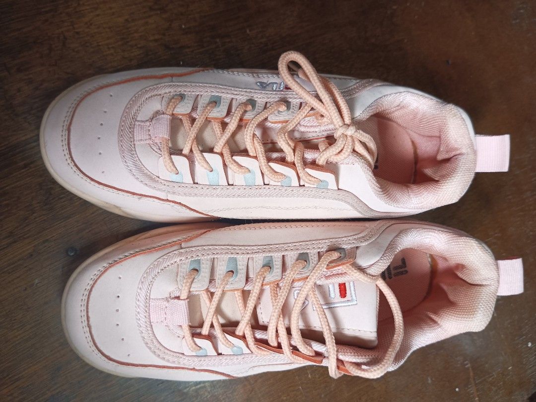 Fila Disruptor II Pink Sneakers (Category: Sneakers) located in Malabon City. Submitted by mslalan (Listing ID 1430805518, Image 2). Description: Pink Fila Disruptor II sneakers. Features the Fila logo on the side and heel. The shoes have pink laces and a chunky sole. The size tag is visible in one of the images..