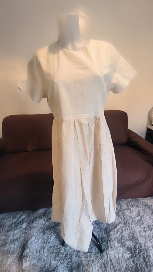 For Me Cream Dress Extra Large (Category: Dresses) located in Antipolo. Submitted by secondcharmstore (Listing ID 1430881819, Image 2). Description: sale 699 Cream-colored dress from For Me. It features short sleeves and a gathered waist. The dress has a round neckline and a slightly flared skirt. The size is extra large. The original price tag is still attached, showing a price of ₱1,798.00. chest: 38 inches waist: 32-34 inches length: 45.5 inch