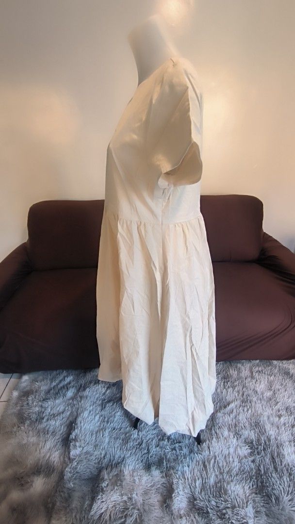For Me Cream Dress Extra Large (Category: Dresses) located in Antipolo. Submitted by secondcharmstore (Listing ID 1430881819, Image 3). Description: sale 699 Cream-colored dress from For Me. It features short sleeves and a gathered waist. The dress has a round neckline and a slightly flared skirt. The size is extra large. The original price tag is still attached, showing a price of ₱1,798.00. chest: 38 inches waist: 32-34 inches length: 45.5 inch