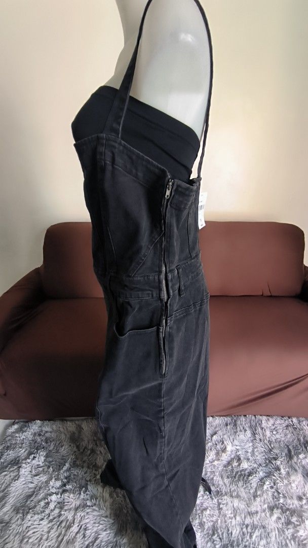 Forever 21+ Black Denim Jumpsuit 1X (Category: Jumpsuits) located in Antipolo. Submitted by secondcharmstore (Listing ID 1430884172, Image 3). Description: sale 549 Black denim jumpsuit from Forever 21+. It is a 1X size. Features include adjustable straps, a zipper closure, and pockets. The original price tag is still attached. chest: 40-42 inches waist: 36-38 inches length: 60 inches.
