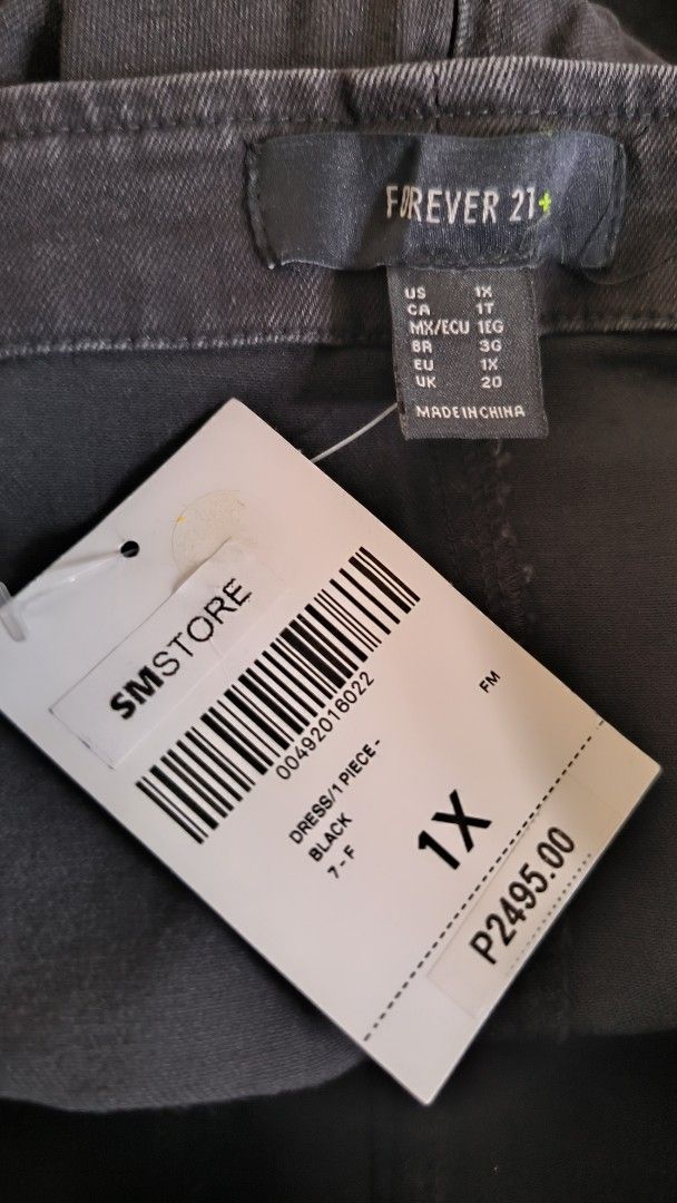Forever 21+ Black Denim Jumpsuit 1X (Category: Jumpsuits) located in Antipolo. Submitted by secondcharmstore (Listing ID 1430884172, Image 1). Description: sale 549 Black denim jumpsuit from Forever 21+. It is a 1X size. Features include adjustable straps, a zipper closure, and pockets. The original price tag is still attached. chest: 40-42 inches waist: 36-38 inches length: 60 inches.