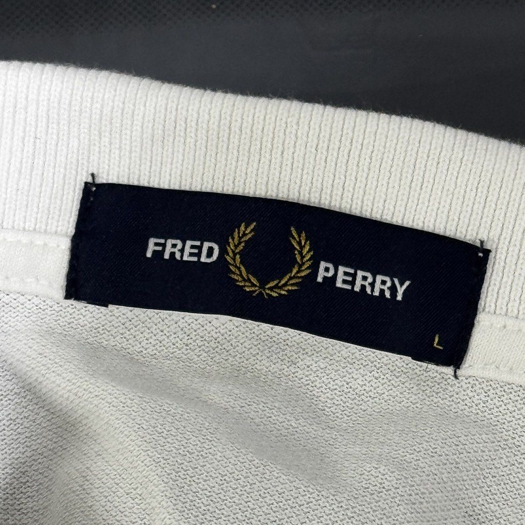 Fred Perry White Polo Shirt Large (Category: Tshirts & Polo Shirts ) located in Manila. Submitted by basicstuffmnl (Listing ID 1430964336, Image 2). Description: Used once for baptism attendee only Not a fan of white clothes. Need to declutter.