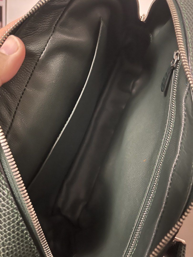 Genuine Lizard Skin Green Leather Handbag (Category: Luxury Bags & Wallets) located in Lipa City. Submitted by AVH22 (Listing ID 1430828749, Image 3). Description: Very good used condition Has some issues under the zipper area due to dragging Plume style .