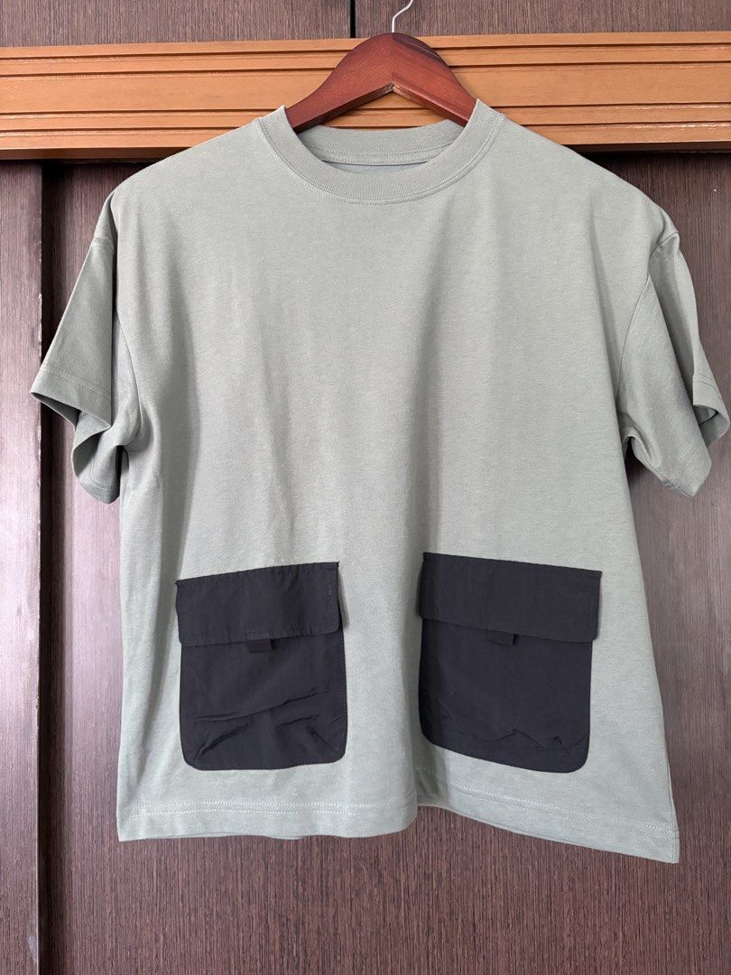 GU Green Pocket T-shirt (Category: Babies & Kids Fashion) located in Manila. Submitted by purple-bunny-lizzie (Listing ID 1430809499, Image 1). Description: From GU Green t-shirt features two black pockets on the front. It has a round neckline and short sleeves. Size 150.