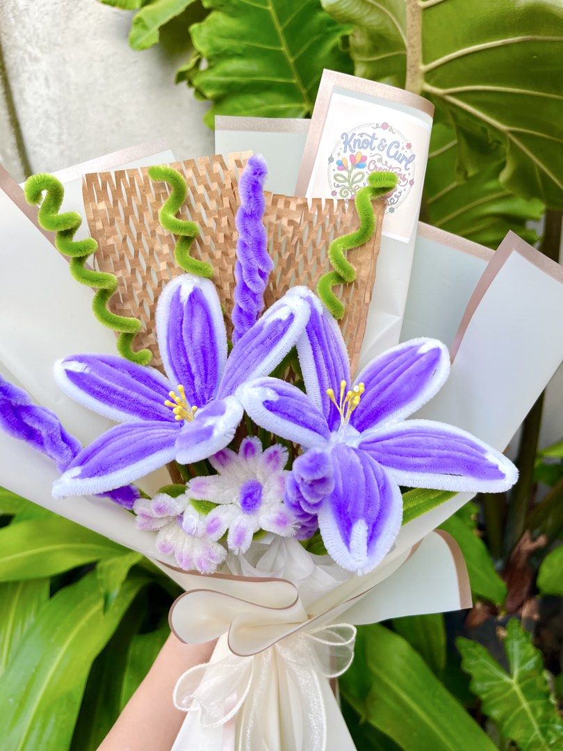 Handmade Fuzzy Wire Flower Bouquet (Category: Flowers & Bouquets) located in Batangas. Submitted by knotandcurl_creations (Listing ID 1430980027, Image 2). Description: - Handmade Fuzzy Wire Flower Bouquet - Features a charming design with purple and white fuzzy wire flowers. - Beautifully wrapped and ready to gift..
