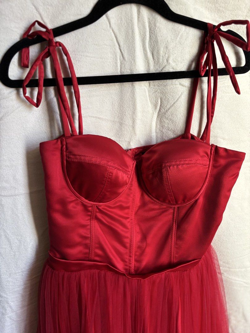 RENT: Heather Clothing Red Dress (Category: Evening dresses & gowns) located in Valenzuela. Submitted by tybur (Listing ID 1430901677, Image 3). Description: - Brand: Heather Clothing - Size: M - Design: Bustier-style top with tie straps and a tulle skirt - Perfect for special occasions - DRESS IS FOR RENT! FOR 3 DAYS (shipping is shouldered by the customer) - With security deposit (refundable) 💌 Message for dress rental guidelines 📍Valenzuela 