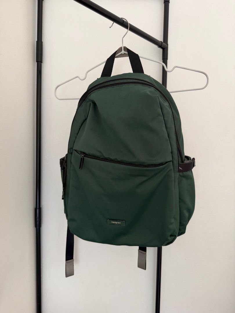 Hedgren Cosmos Backpack - Green (Category: Backpacks) located in Marilao. Submitted by mebslerman (Listing ID 1430905677, Image 2). Description: ‘-INTERIOR FEATURES -Main compartment has an organiser with key chain inside -padded laptop sleeve that fits laptop up to 13” -EXTERIOR FEATURES -Double padded, adjustable shoulder straps -Two snap-button side pockets -Black hardware -Water- and dust repellent material -Two-tone cube hanger - Flaws shown
