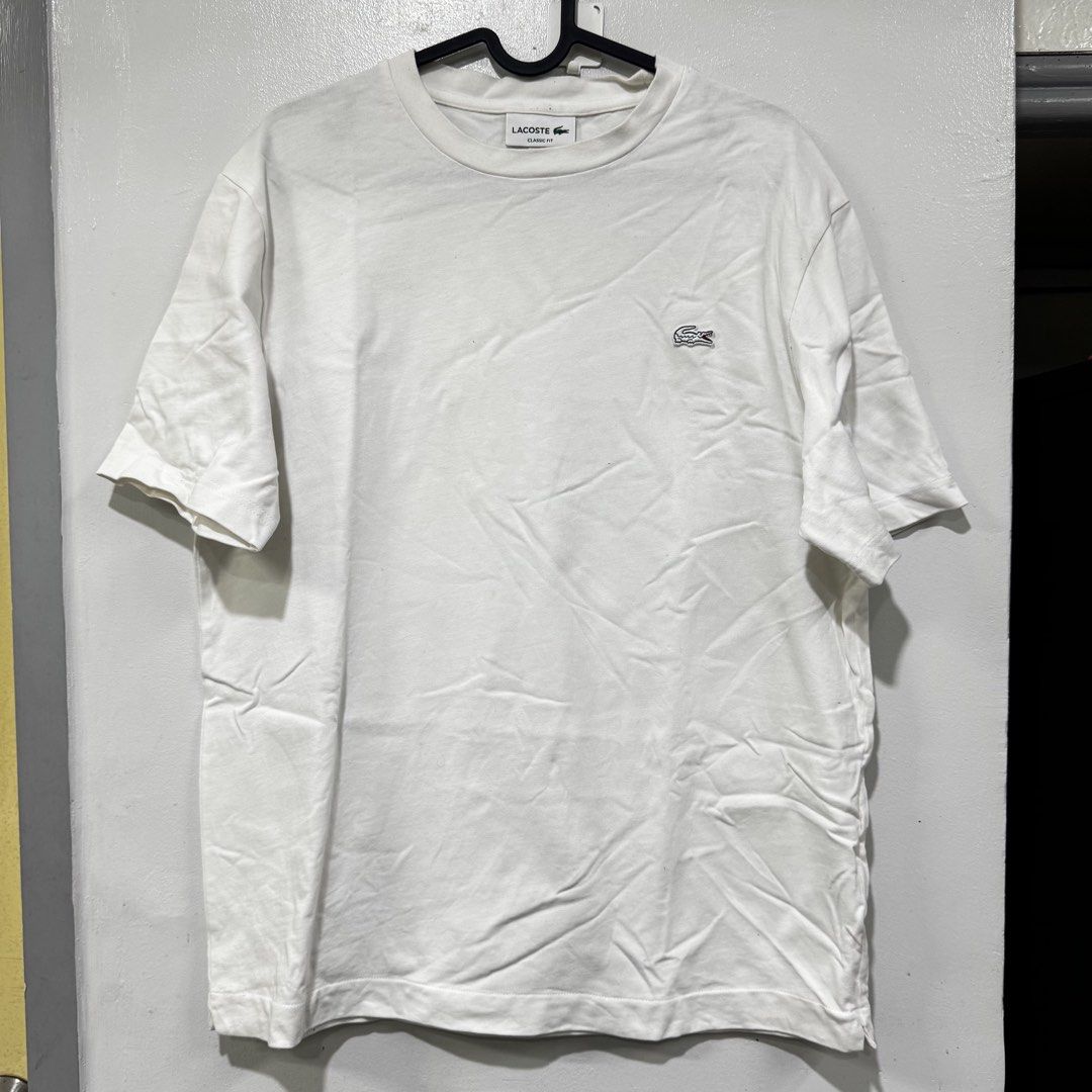 Lacoste Medium Classic Fit white Shirt Size 4 (Category: Tshirts & Polo Shirts ) located in Manila. Submitted by basicstuffmnl (Listing ID 1430964743, Image 1). Description: Use twice only not a white shirt person Does not fit me also anymore.
