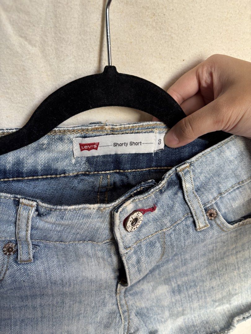 Levi's Shorty Short Size 8 (Category: Shorts) located in Valenzuela. Submitted by tybur (Listing ID 1430897415, Image 2). Description: - Levi's Shorty Shorts - Size 3 - Light blue wash - Raw hem - Classic Levi's back pocket and red tab - Button closure with red accent - Perfect for casual wear 📍Valenzuela City.