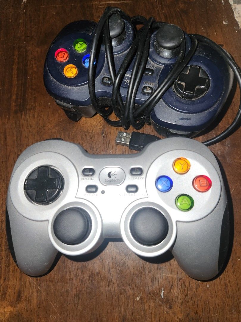 Logitech Double Controller Bundle (Category: Controllers) located in Gelugor. Submitted by izmerican5 (Listing ID 1430875546, Image 2). Description: Logitech Wired and Wireless Bundle 2 Negotiable abit.
