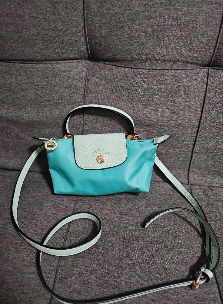 Longchamp Le Pliage Cuir Handbag - Turquoise (Category: Ear Care) located in Mandaue City. Submitted by chuchi152615 (Listing ID 1430827525, Image 2). Description: .