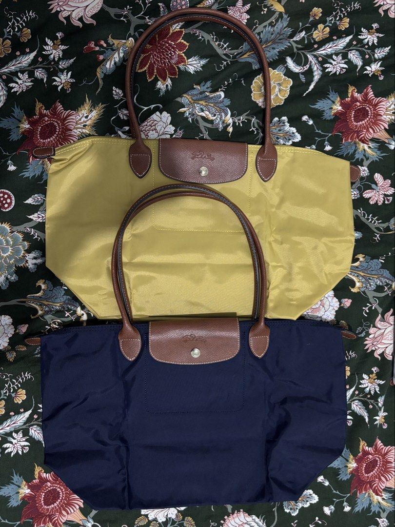 Longchamp Le Pliage Tote Bag (Category: Luxury Bags & Wallets) located in Manila. Submitted by decluttaro (Listing ID 1430961232, Image 1). Description: Longchamp Le Pliage Large Navy Blue (SOLD) Mustard Yellow (AVAILABLE) Japan preloved 🇯🇵 Used 1-2x Dm for more pictures.