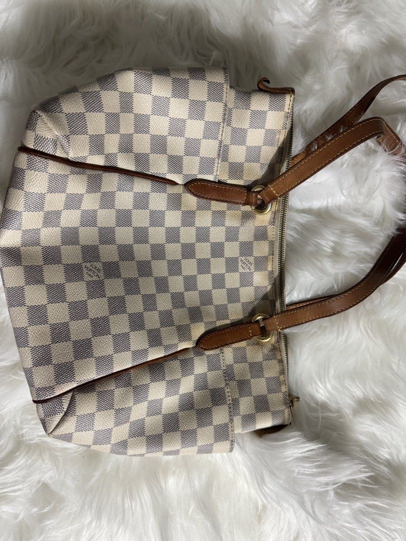 Louis Vuitton Damier Azur Totally (Category: Luxury Bags & Wallets) located in Quezon City. Submitted by jbspreloved (Listing ID 1430814884, Image 2). Description: LV Totally in Damier azur With dustbag Well used With slight yellowing (discoloration) Clean on the inside.