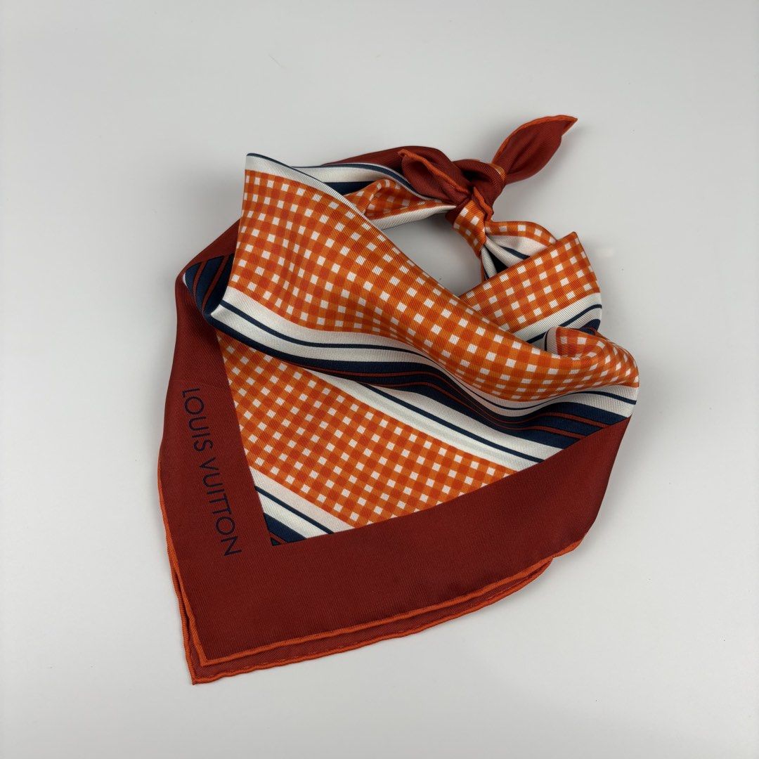Louis Vuitton Silk Neck Scarf (Category: Luxury Accessories) located in Bacolod City. Submitted by cast.archives (Listing ID 1430957217, Image 1). Description: Louis Vuitton Silk Neck Scarf Authentic Size: Small Condition: Excellent Flaw: Missing tag Measurement Width: 17" Length: 17".