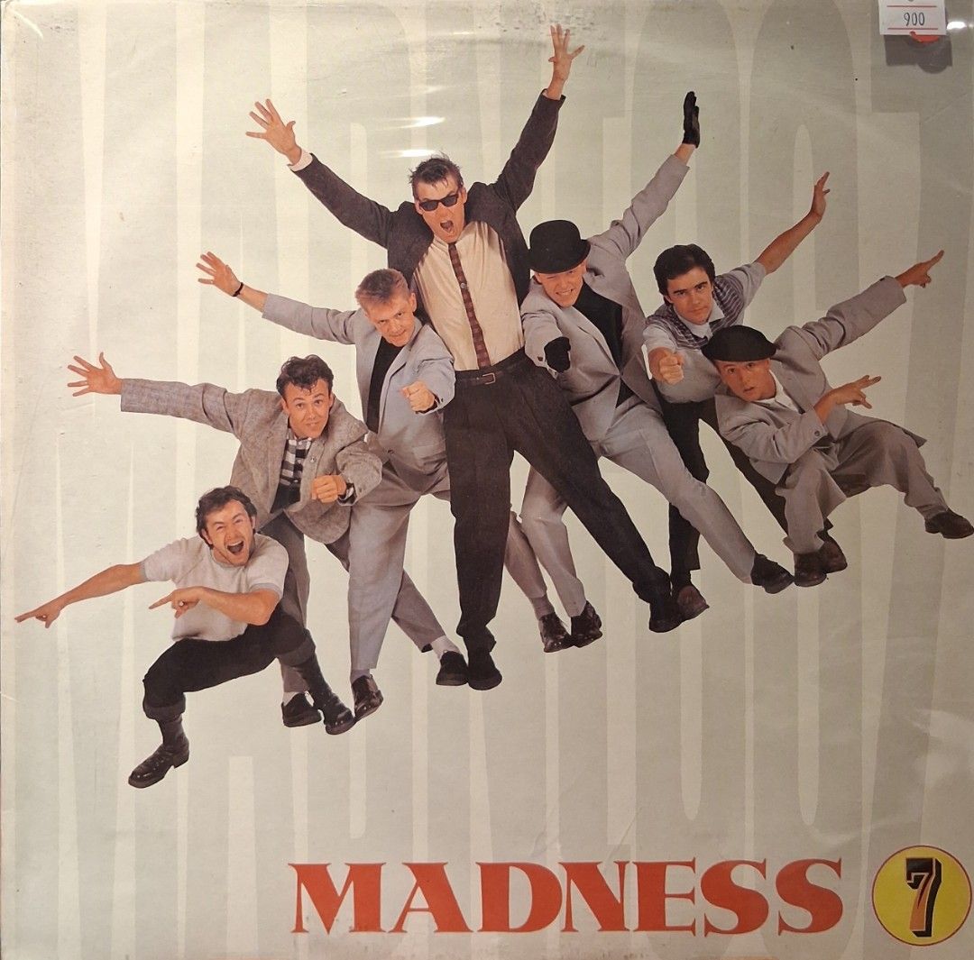 Madness - 7 Vinyl Record (Category: Vinyls) located in Quezon City. Submitted by pooh_laa (Listing ID 1430861739, Image 1). Description: Original vinyl record of the album "7" by Madness. Features the band members in a dynamic pose on the cover. The album title and band name are clearly visible. A price tag is visible on the top right corner. A great addition for any Madness fan or vinyl collector..