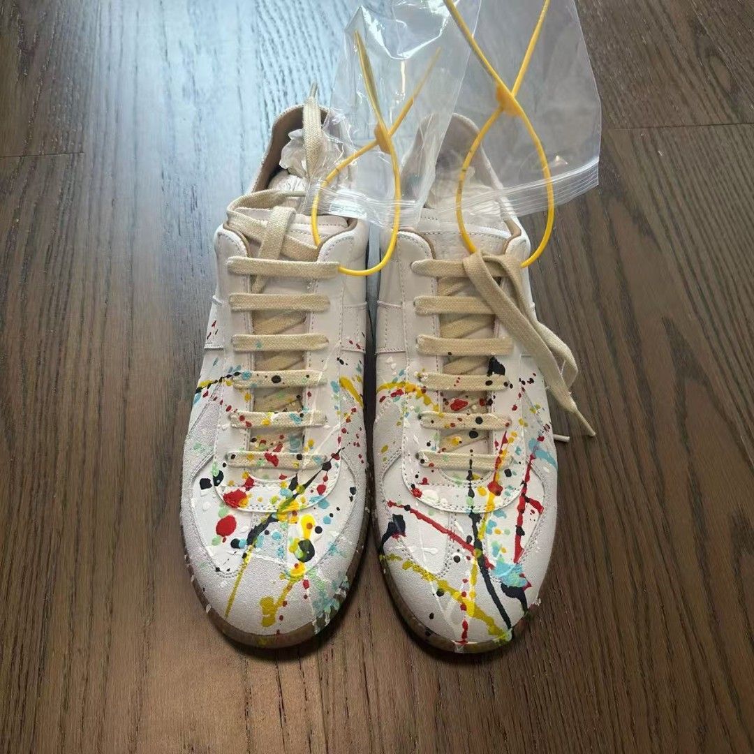 Maison Margiela gats(White paint splatter) (Category: Sneakers & Footwear) located in Makati City. Submitted by donda.archives (Listing ID 1430925595, Image 3). Description: Size 40-47. Batch with fully built-in NFC chip. Imported INCAS leather used. The leather has a nice matte finish, and the overall shoe shape is solid with no issues. The overall leather color is consistent. Everything follows the same standards: the entire shoe is genuine lea